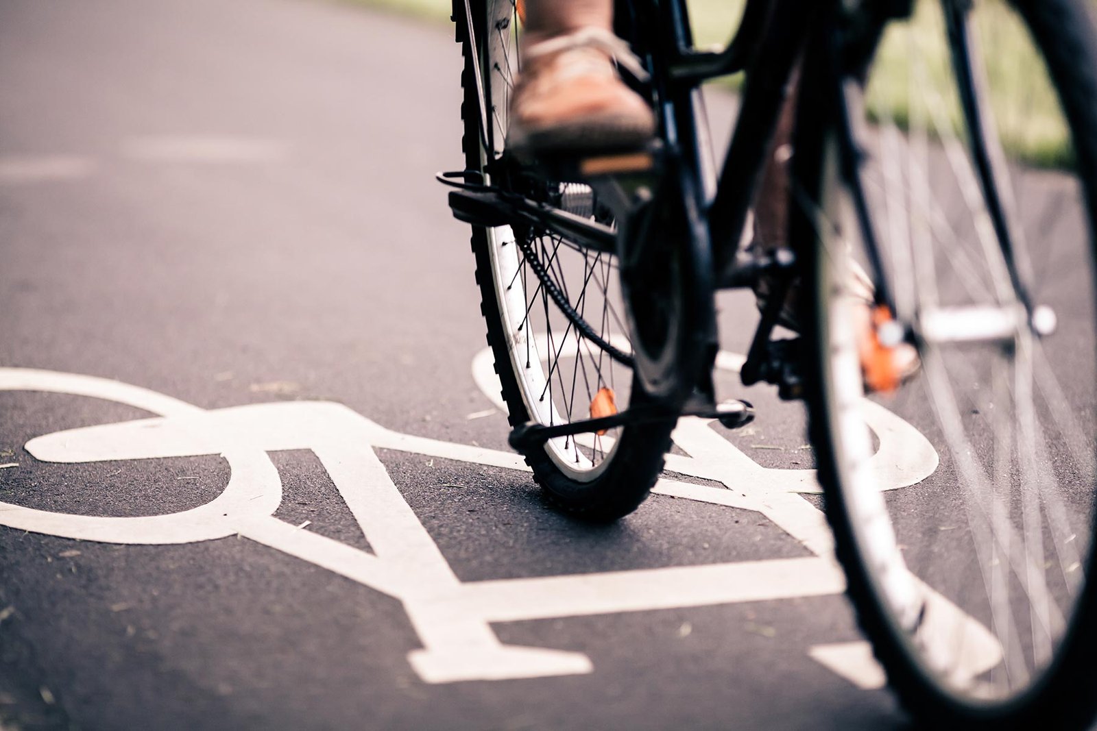 city bicycle riding on bike path pfvh42d