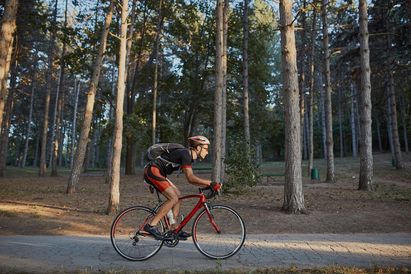 young man are cycling road bike in the evening ptqxh5q.jpg